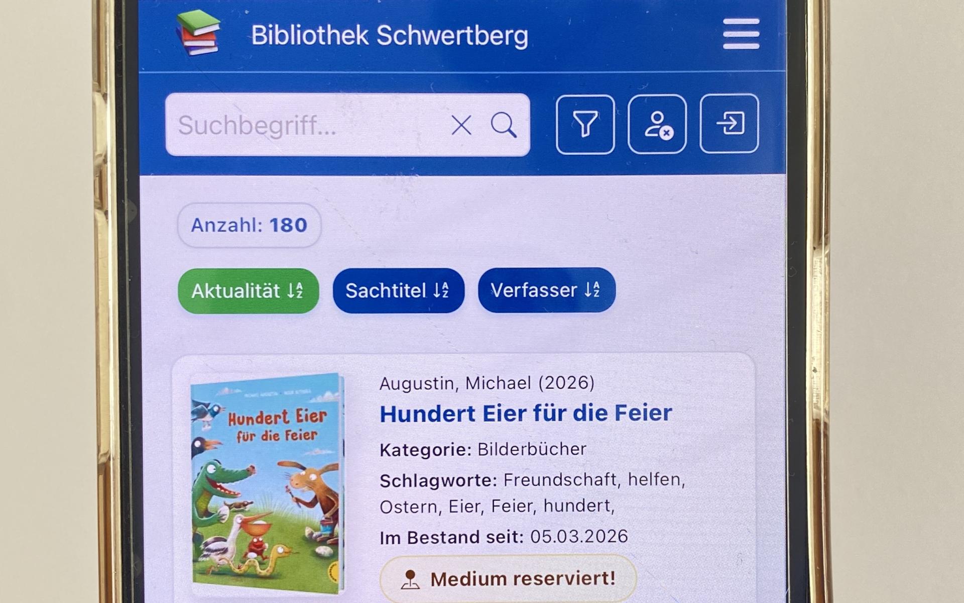 Handy mit aufgerufenen online-Medienkatalog